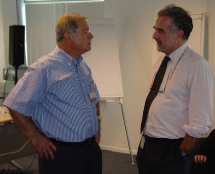 Judge Almiro Rodrigues (on the left) with Chief Prosecutor Luis Moreno-Ocampo during an ICC-OTP guest lecture at the interim seat of the ICC on 23 June 2006.