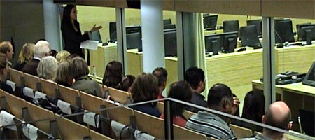 Members of the public visiting the ICC view Courtroom I from the public gallery ©ICC-CPI