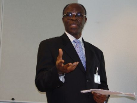 Chief Akinlolu Olujinmi, SAN presenting the ICC-OTP Guest Lecture at the interim seat of the Court on 2 June 2005.